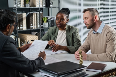 couple consulting with a lawyer