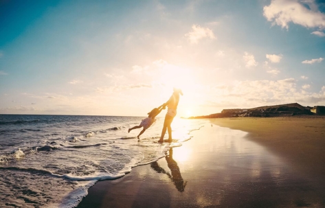 Mother and daughter on beach